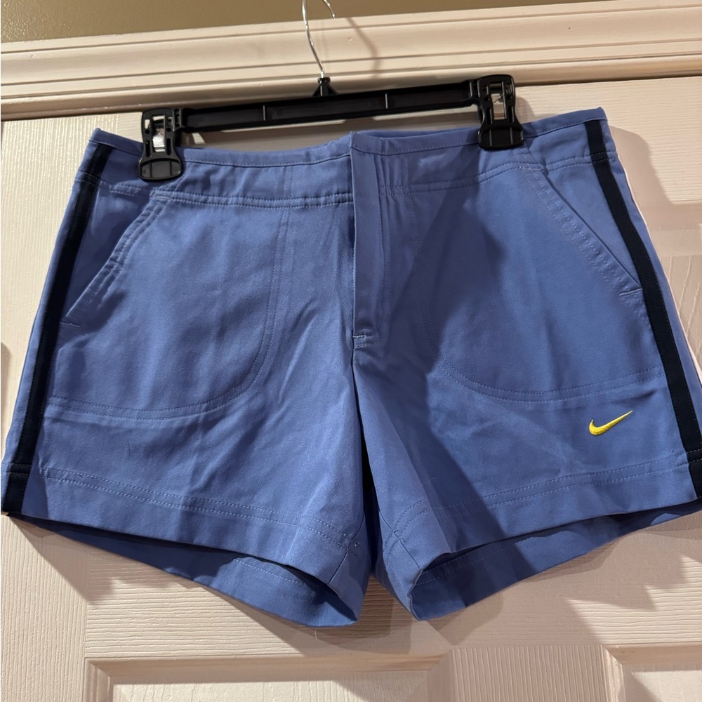 Nike Blue Athletic Shorts with Yellow Logo and Lightweight Fabric